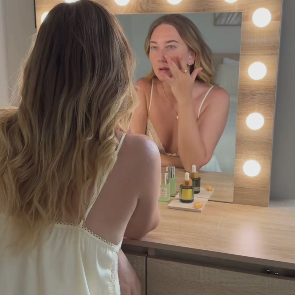 Load video: Woman applying bakuchiol serum to face – gentle retinol alternative for daily use